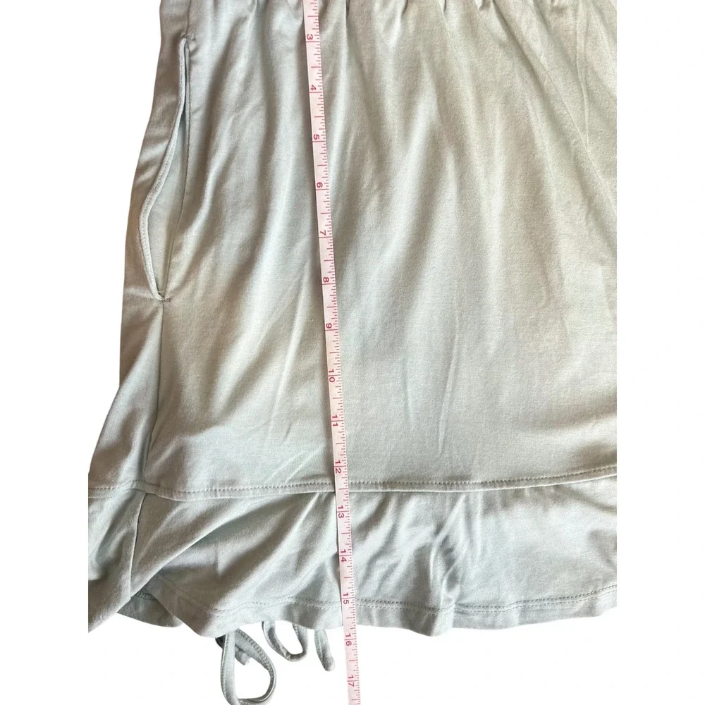 Halara Pistachio Green Smocked Ruched Mini Skirt with Pockets Size Small NWT